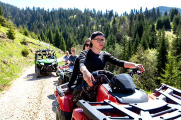 A tour group travels on ATVs and UTVs on the mountains © FS-Stock