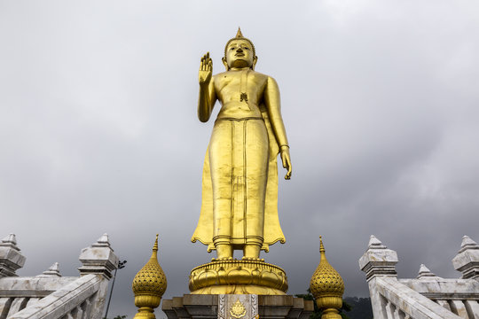 Phra Buddha Mongkol Maharaj tallest Golden Standing Buddha at Hat Yai Municipal Park, Hat Yai Thailand