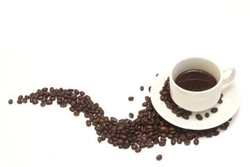Coffee cup and coffee beans on white background
