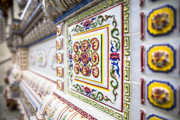 Chinese buddhist temple wall at Supasarnrangsan Road Hat Yai Songkhla  Thailand