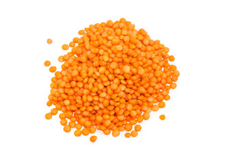 Pile of split red lentil on a white background