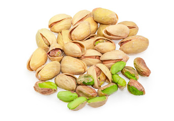 Pile of the partly peeled roasted salted pistachio nuts