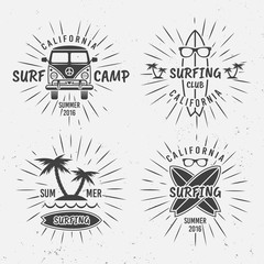 Surfing vector vintage black labels with rays © Flat_Enot