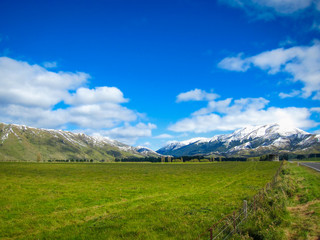 Landscape of field and mountain in New Zealand