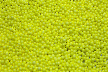 Small Yellow Polysterene balls background