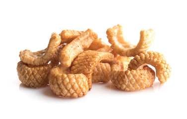 Crunchy corn snacks on a white background