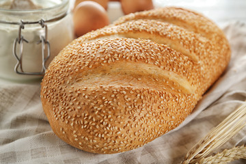 Loaf of bread on table. Fresh from oven