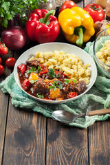 Hungarian beef goulash serwed with galuska noodles
