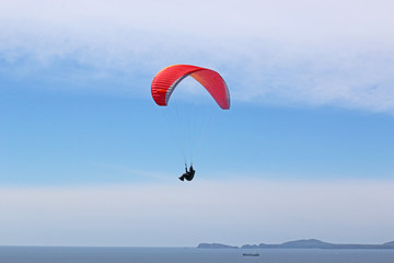 Paraglider above Newgale Bay, Wales