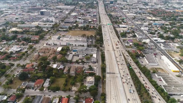 Aerial shot of highway intersection, I-95 and MacArthur Causeway. Aerial view of Miami freeway junction.