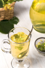 Glass cup with linden tea
