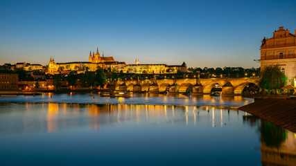 Fototapeta na wymiar Panorama view of Saint Vitus Cathedral with Prague city skyline at night in Prague, Czech Republic
