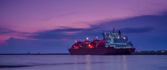 LNG TANKER - Ship at dawn moored to the gas terminal