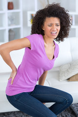 woman with severe lower back pain
