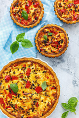 Homemade quiche with chicken, onions and pepper.