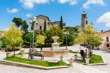 Tuinposter Greccio, Italy.   The very little medieval town in Lazio region, famous for the catholic sanctuary of Saint Francis © puckillustrations