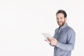 portrait of smiling man with digital tablet in hands isolated on white