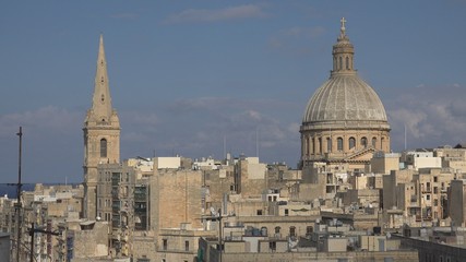 Fototapeta na wymiar 4K Aerial view of famous Malta cathedral dome building by day, touristic attraction