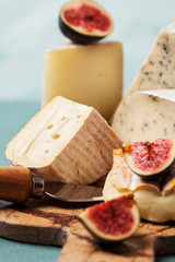 Variety of cheeses on serving board