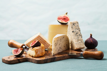 Variety of cheeses on serving board