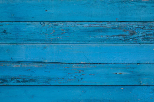 Horizontal background old painted blue board. Vintage texture