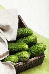 Green cucumber basket background, bowl.