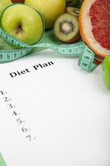 Food and sheet of paper with a diet plan