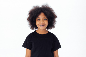 Cute and happy African American kid smiling and laughing isolated over white background