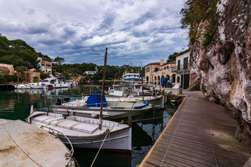Fototapeta na wymiar Picturesque small harbor in the south of Mallorca, Balearic islands, Spain. Mediterranean seascape.