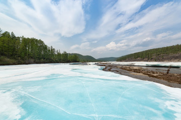 Turquoise ice on the river