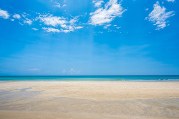 Sand beach and blue sky background