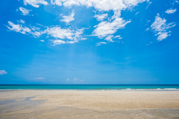 Sand beach and blue sky background