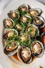 Steamed abalone dish at a chinese restaurant a very popular dish at asian wedding reception ceremonies