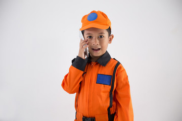 asian little boy with technician, engineer or astronaut uniform