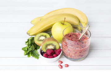 Berry dessert smoothie banana Kiwi Apple Parsley Raspberry Nuts for Breakfast.
