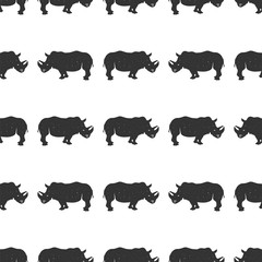 Rhino seamless. Wild animal wallpaper. Stock rhinoceros pattern isolated on white background. Monochrome Vintage hand drawn design