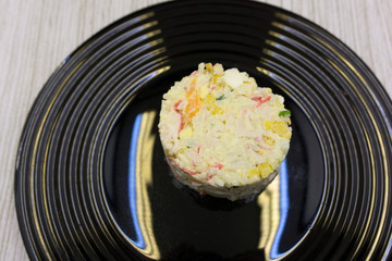 Salad with crab sticks corn and eggs .