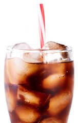 Cola in glass with straw and ice cubes isolated on white background. Soda with bubbles isolated on white. Refreshing non-alcoholic drink