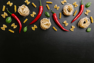 Arrangement of pasta and chili peppers