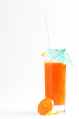 Cocktail with an umbrella on a white background.