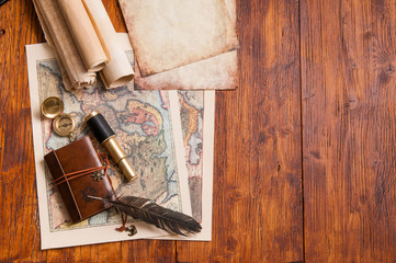 Quill pen, notebook, old papers and vintage items