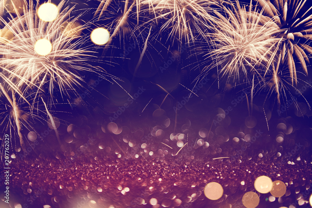 Wall mural gold and dark fireworks and bokeh in new year eve and copy space. abstract background holiday.