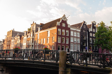 sunrise on the streets and canals of amsterdam
