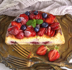 cheesecake made of cottage cheese and fresh strawberries on a plate
