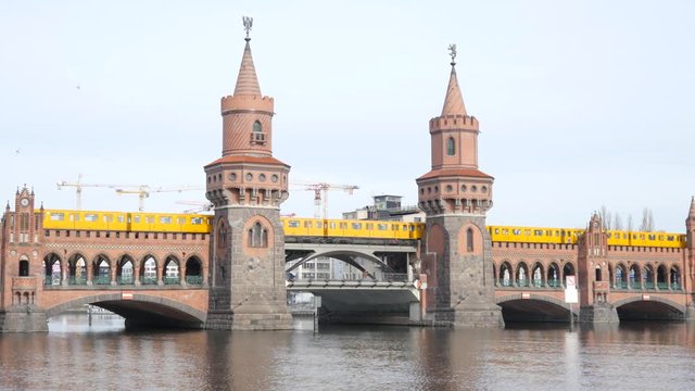 Early morning in Berlin, U-Bahn Crosses the Oberbaum Bridge