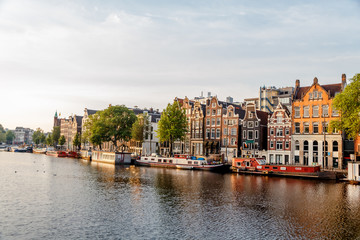 sunrise on the streets and canals of amsterdam