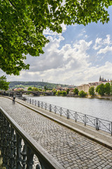 Naklejka na ściany i meble The View from embankment of Prague