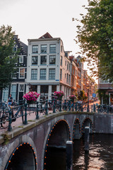 sunset on the streets and canals of Amsterdam