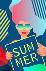 A woman  holding a sign that says Summer. 