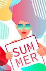 A woman  holding a sign that says Summer. 